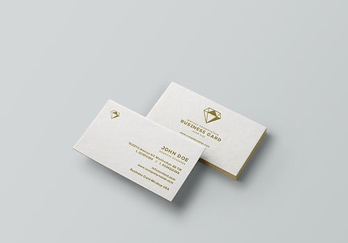 Two Business Cards On A White Background.
